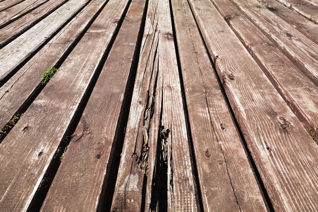 Sagging and rotting floorboards are a sign that you need a new deck construction.